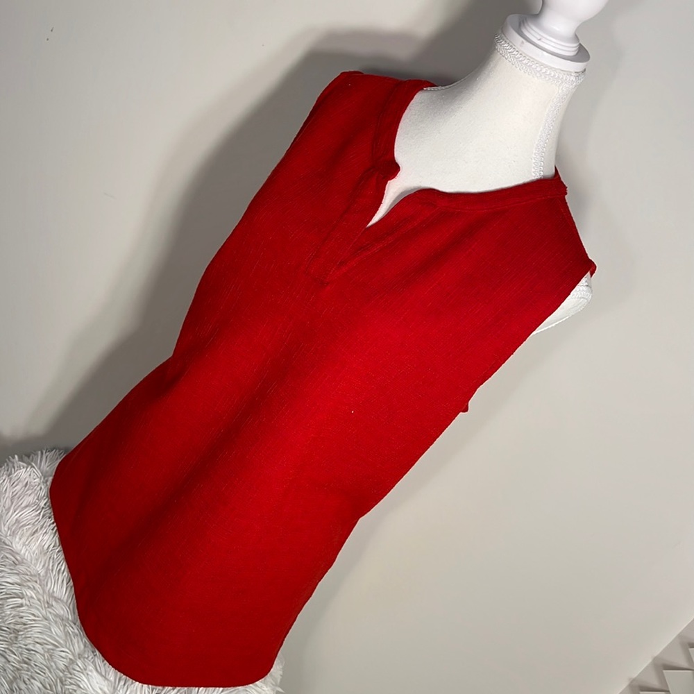 Red V-neck sleeveless blouse